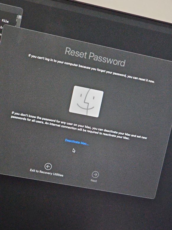 Reset Password screen showing Deactivate Mac link with smiley face icon and explanation text